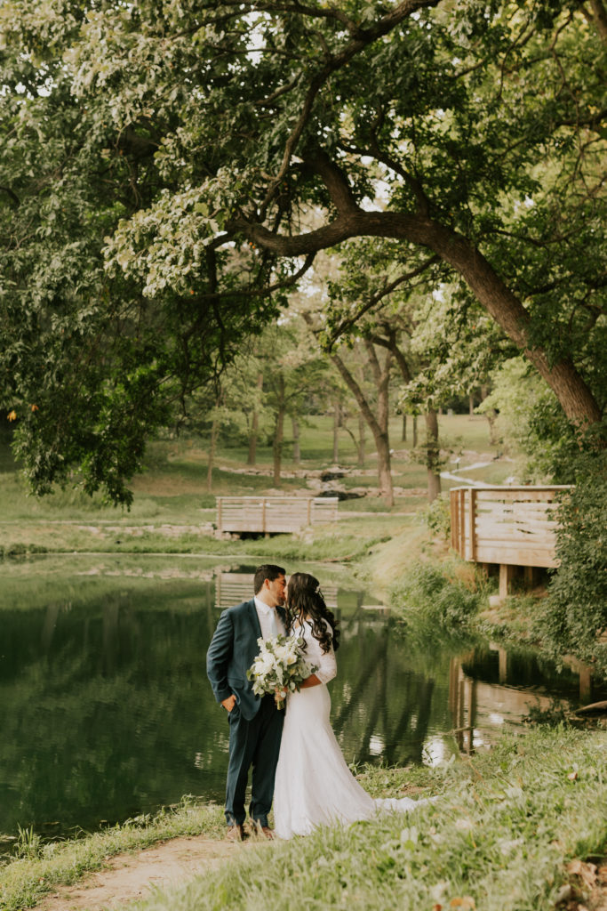bride and groom celebrating recent marriage at louisville lakeside bridal session