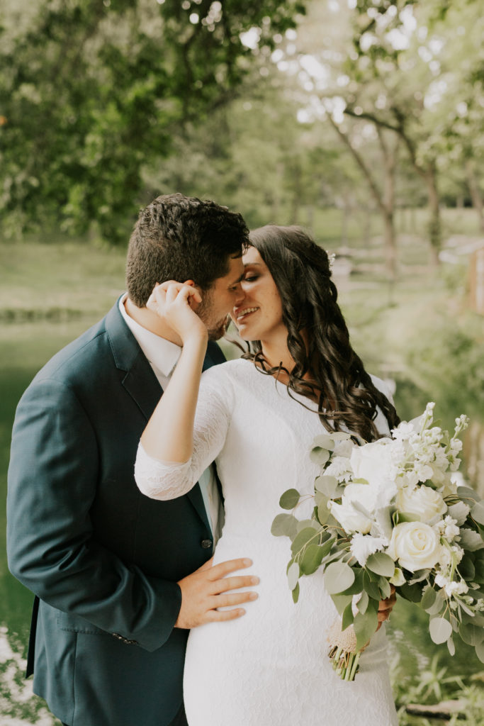 bride and groom kissing during bridal session in louisville nebraska