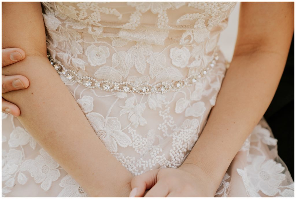 bride's lacy wedding gown