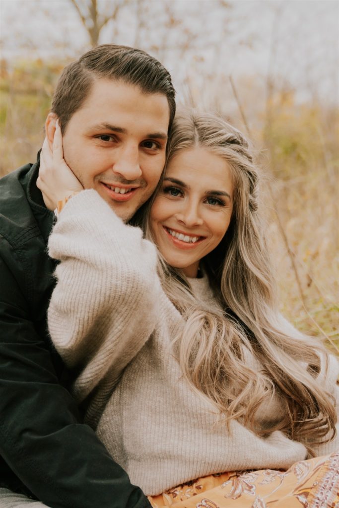 man and woman posing during family shoot in nebraska