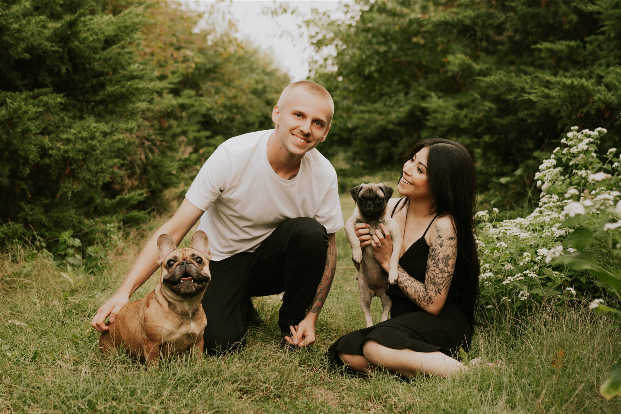 couple posing with dog during fall couple session