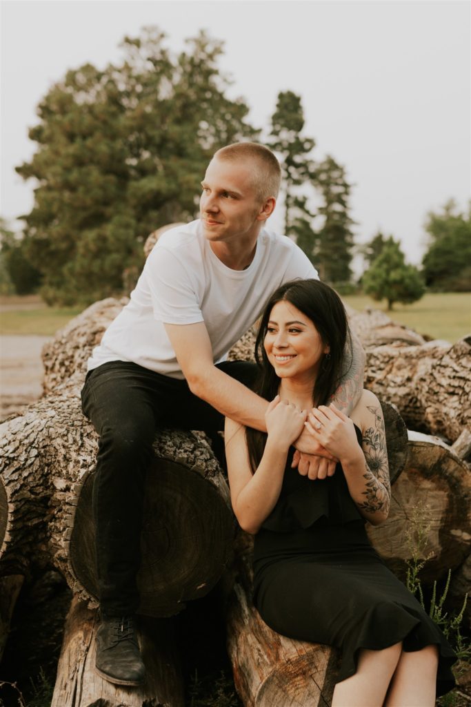 woman and man posing during fall couples session