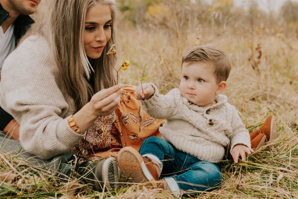 mother and son posing during family session during fall session