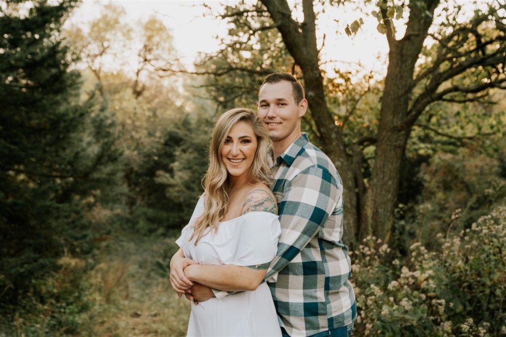 couple wearing perfect engagement outfits during outdoor omaha engagement session