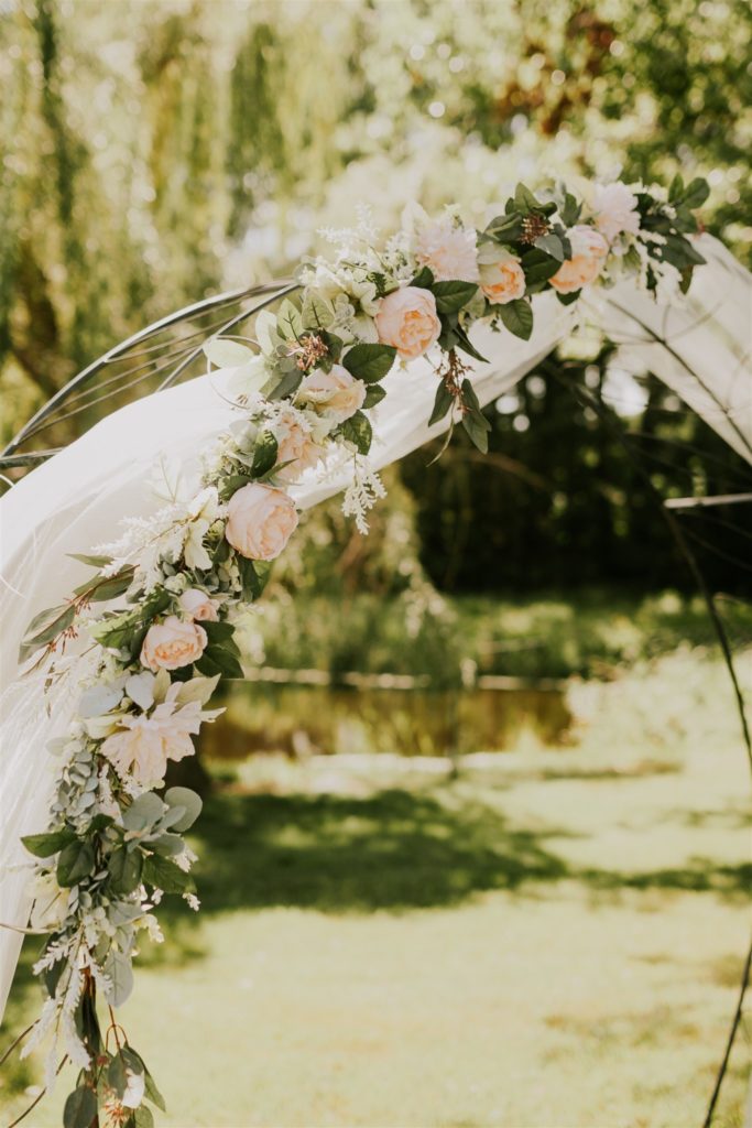 wedding arch with flowers during wedding